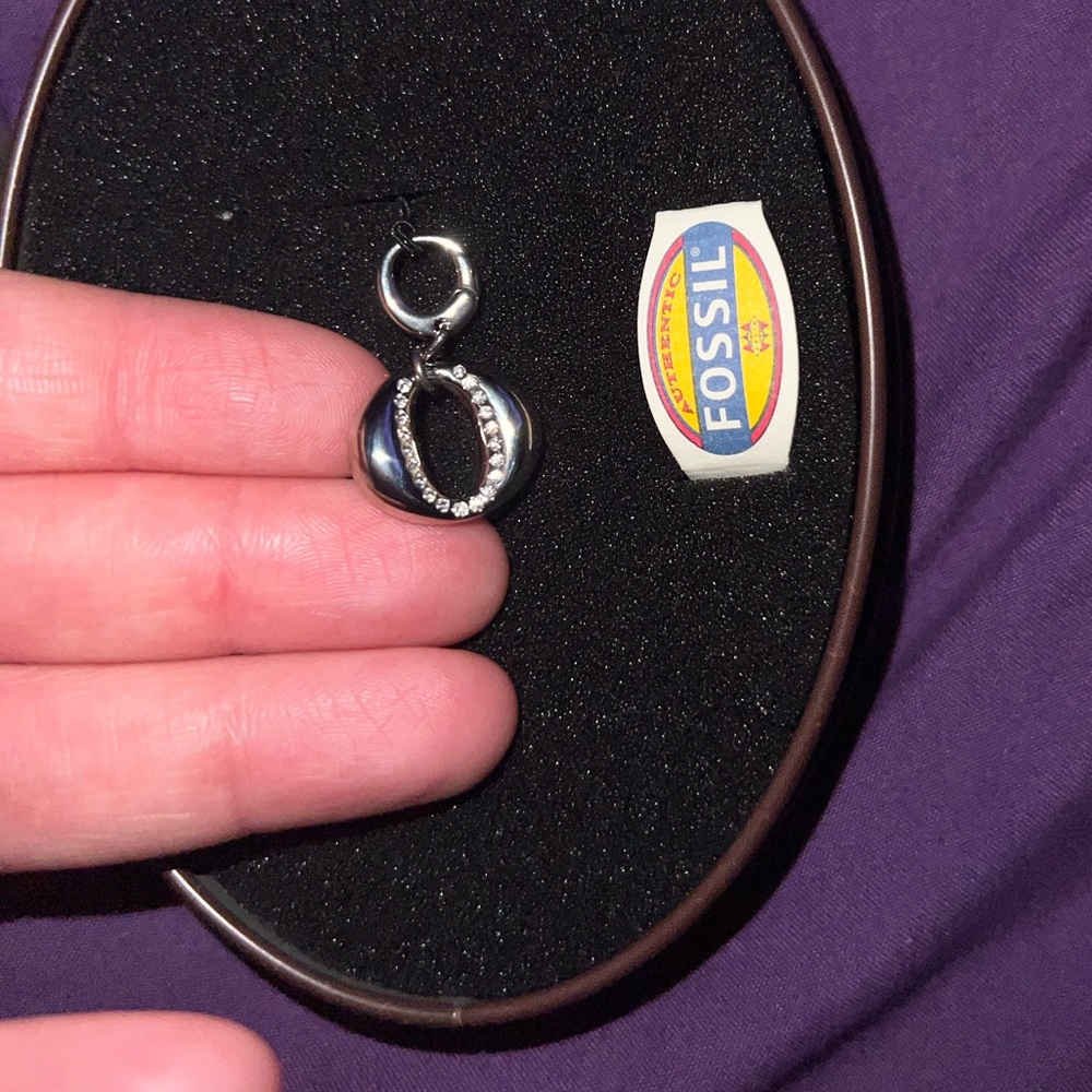 Fossil letter O charm